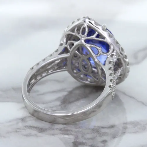 6.08ct Pear Shaped Blue Sapphire Ring with Sapphire and Diamond halo in 18K White Gold
