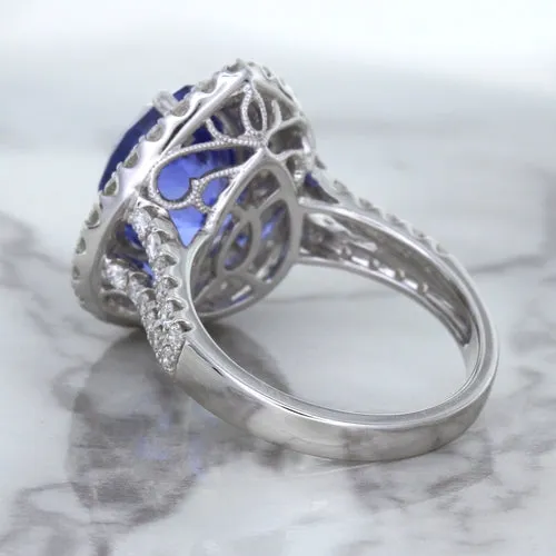 6.08ct Pear Shaped Blue Sapphire Ring with Sapphire and Diamond halo in 18K White Gold