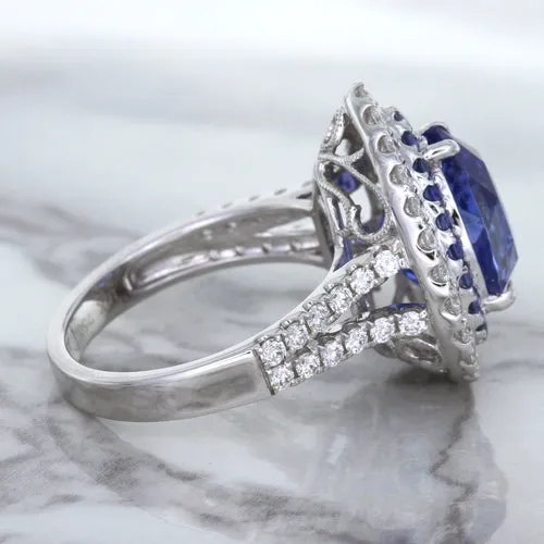 6.08ct Pear Shaped Blue Sapphire Ring with Sapphire and Diamond halo in 18K White Gold