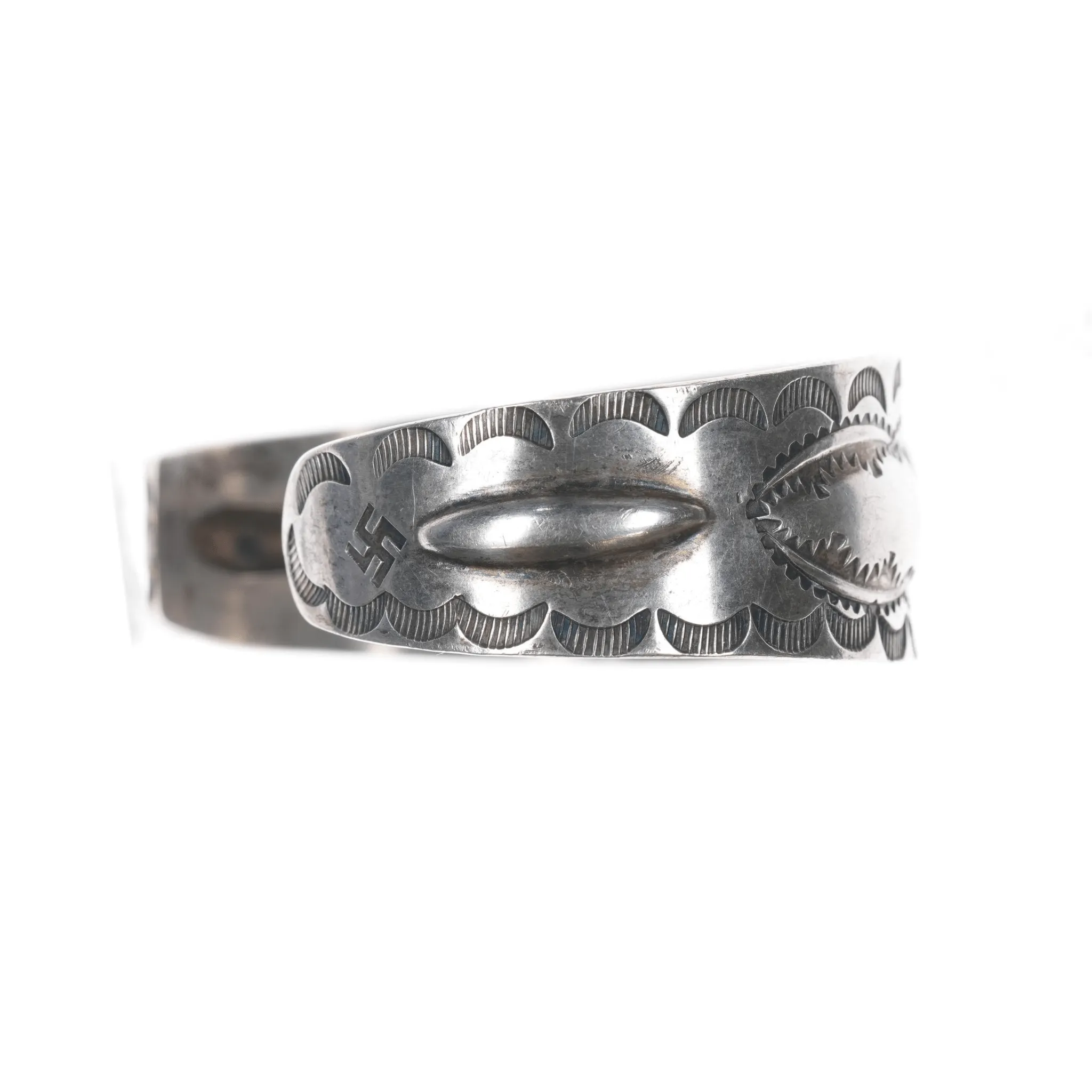 7" 1930's Navajo hand stamped silver whirling logs cuff bracelet with turquoise