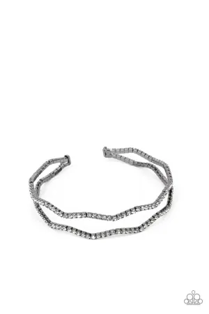 Delicate Dazzle - Black - White Rhinestone Gunmetal Paparazzi Flex Cuff Bracelet