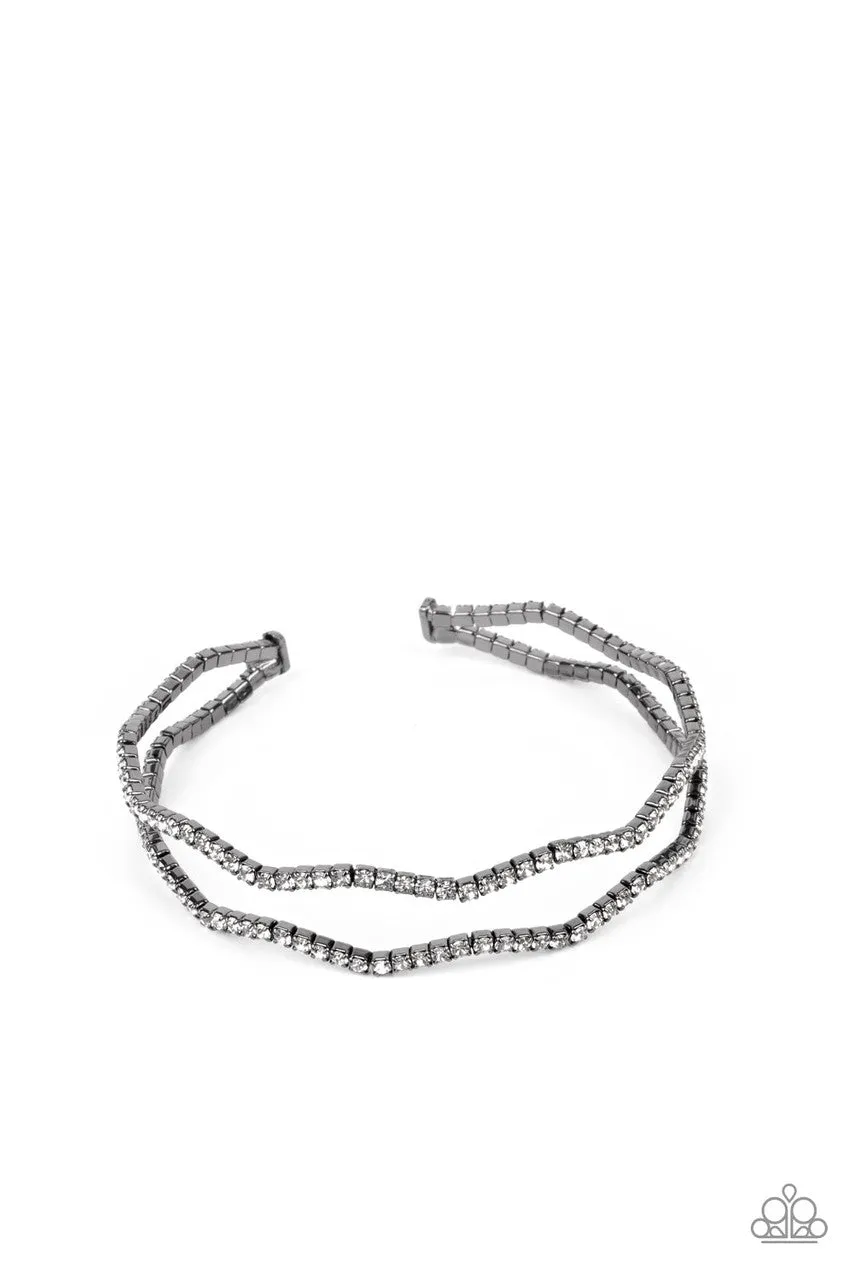 Delicate Dazzle - Black - White Rhinestone Gunmetal Paparazzi Flex Cuff Bracelet