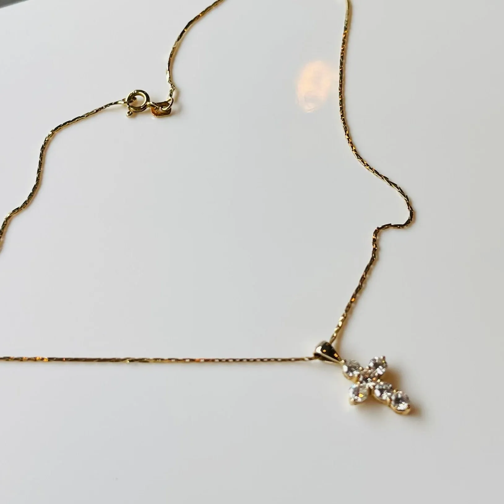 Diamond prong pendant cross