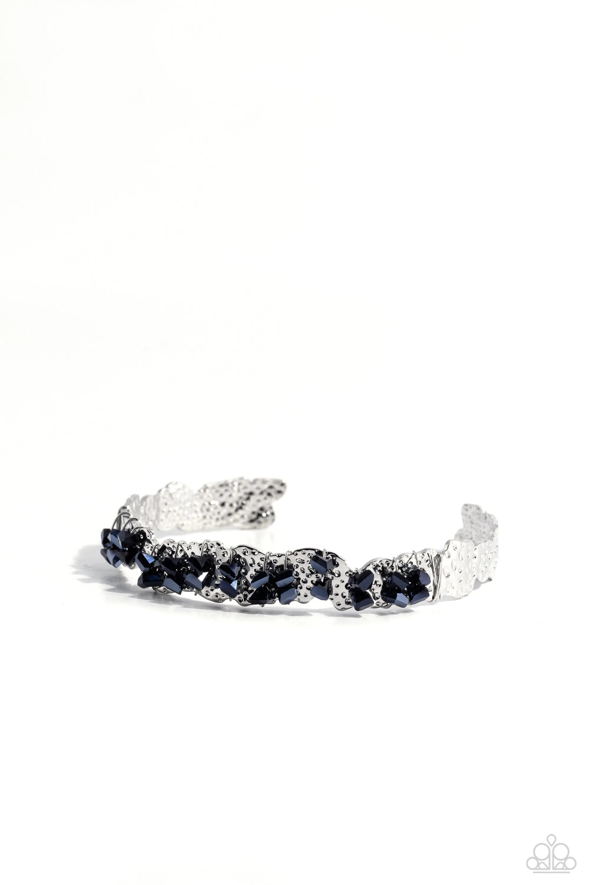 Enticingly Icy - Blue - Metallic Gem Hammered Asymmetrical Paparazzi Cuff Bracelet