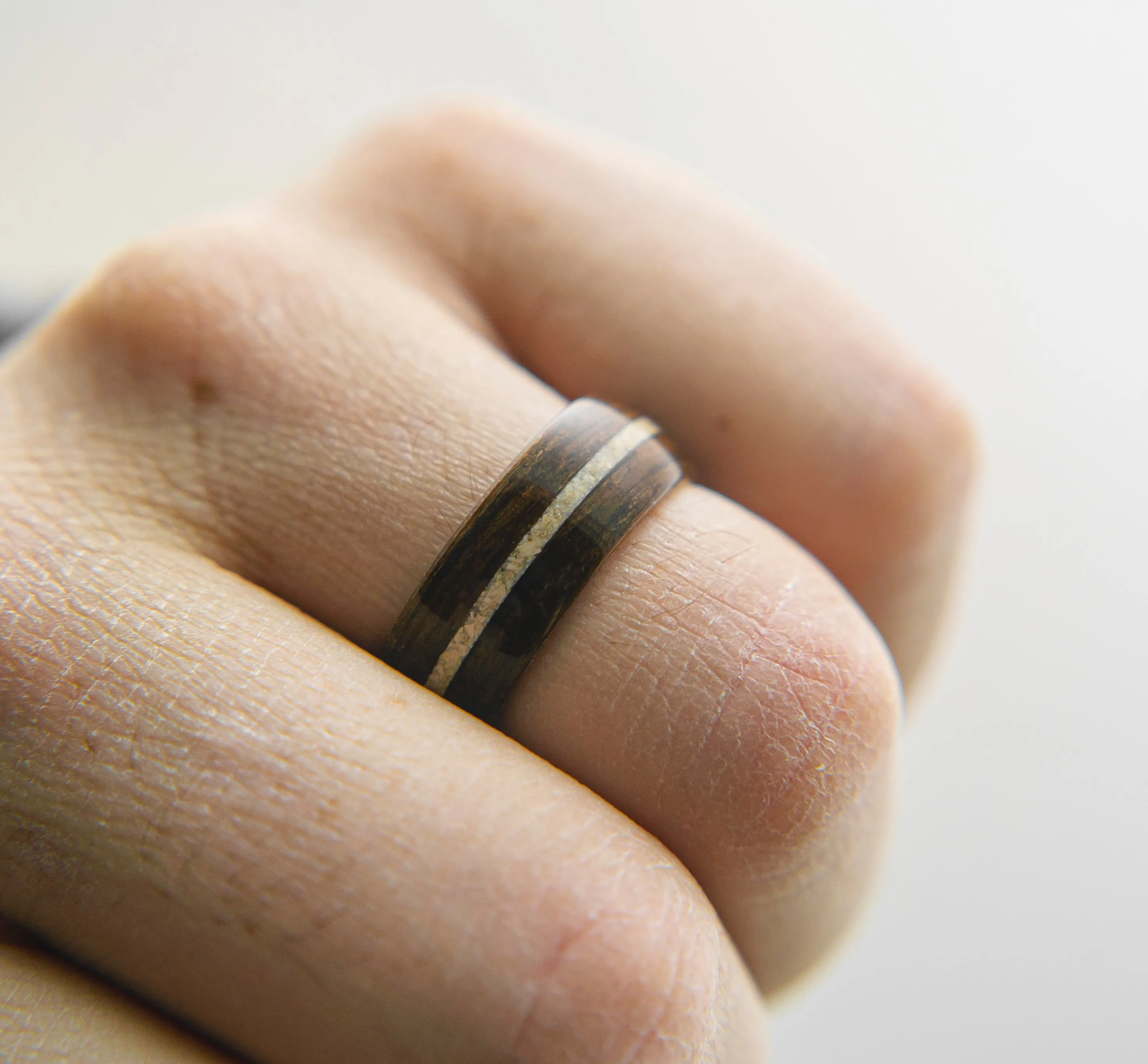 Mens Wedding band featuring Ancient Bog Oak with Woolly Mammoth Tusk inlay.