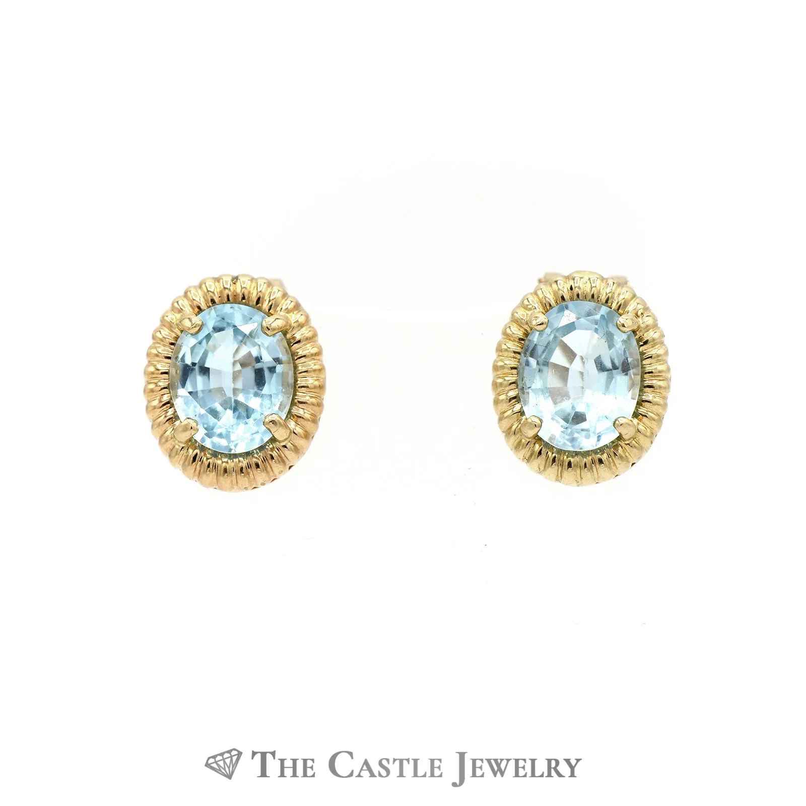 Oval Blue Topaz Earrings with Ribbed Gold Bezel in 14K Yellow Gold