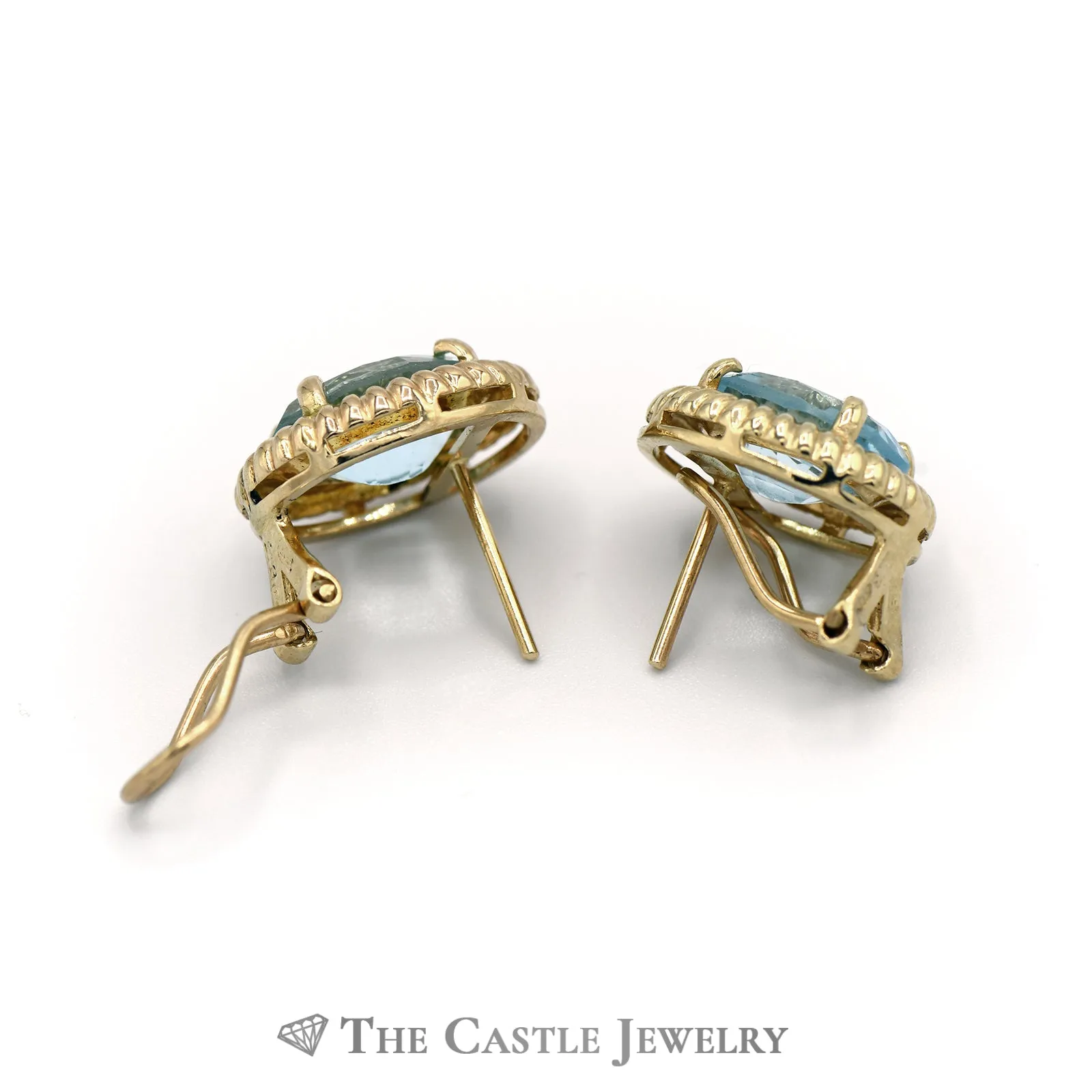 Oval Blue Topaz Earrings with Ribbed Gold Bezel in 14K Yellow Gold