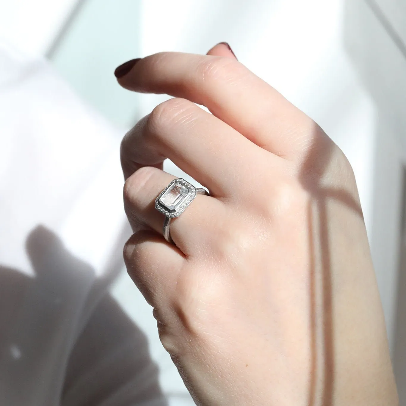 Platinum & East-West Emerald-Cut White Sapphire Ring with Diamonds