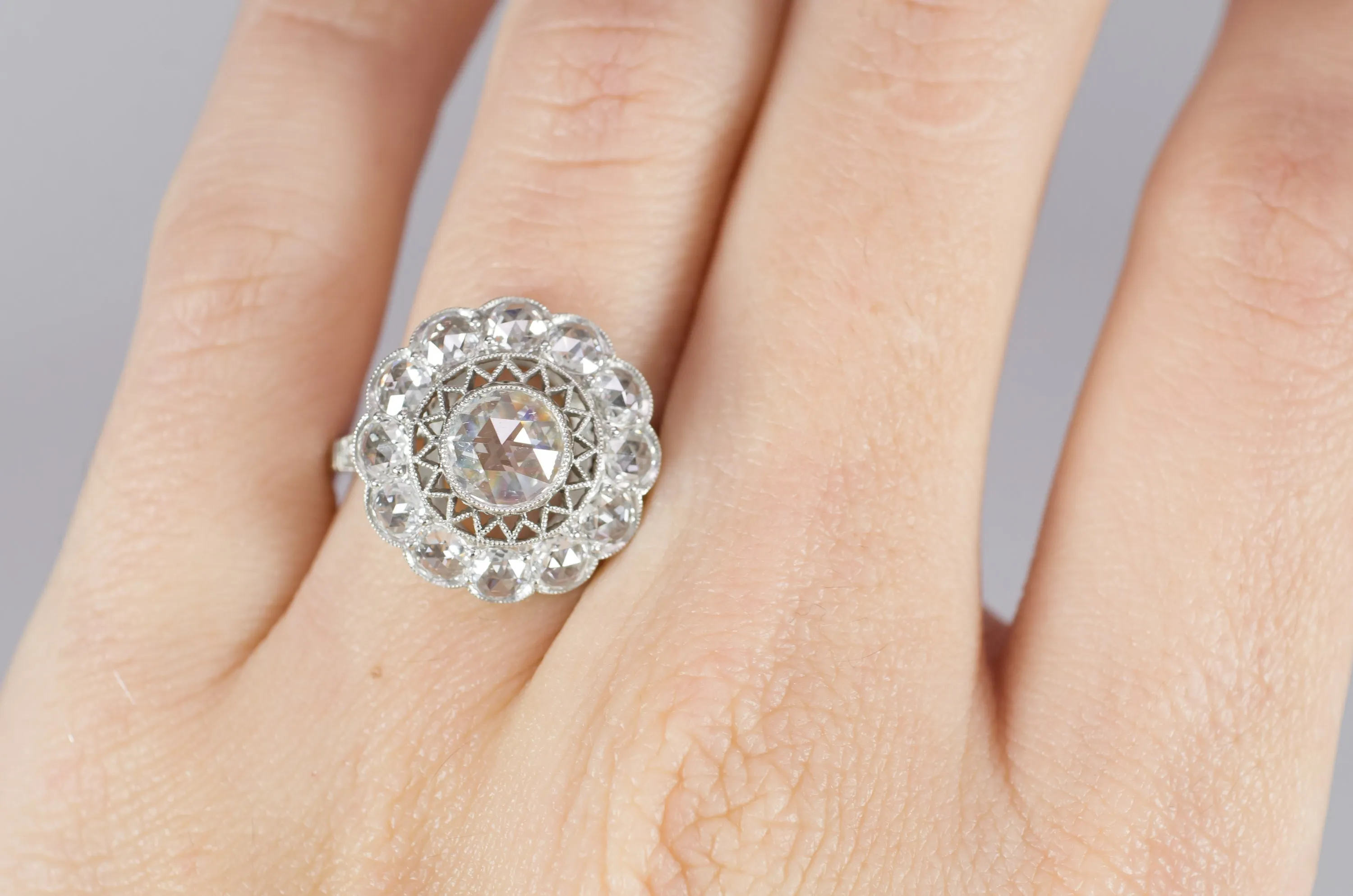 ROSE CUT DIAMOND HALO RING IN PLATINUM