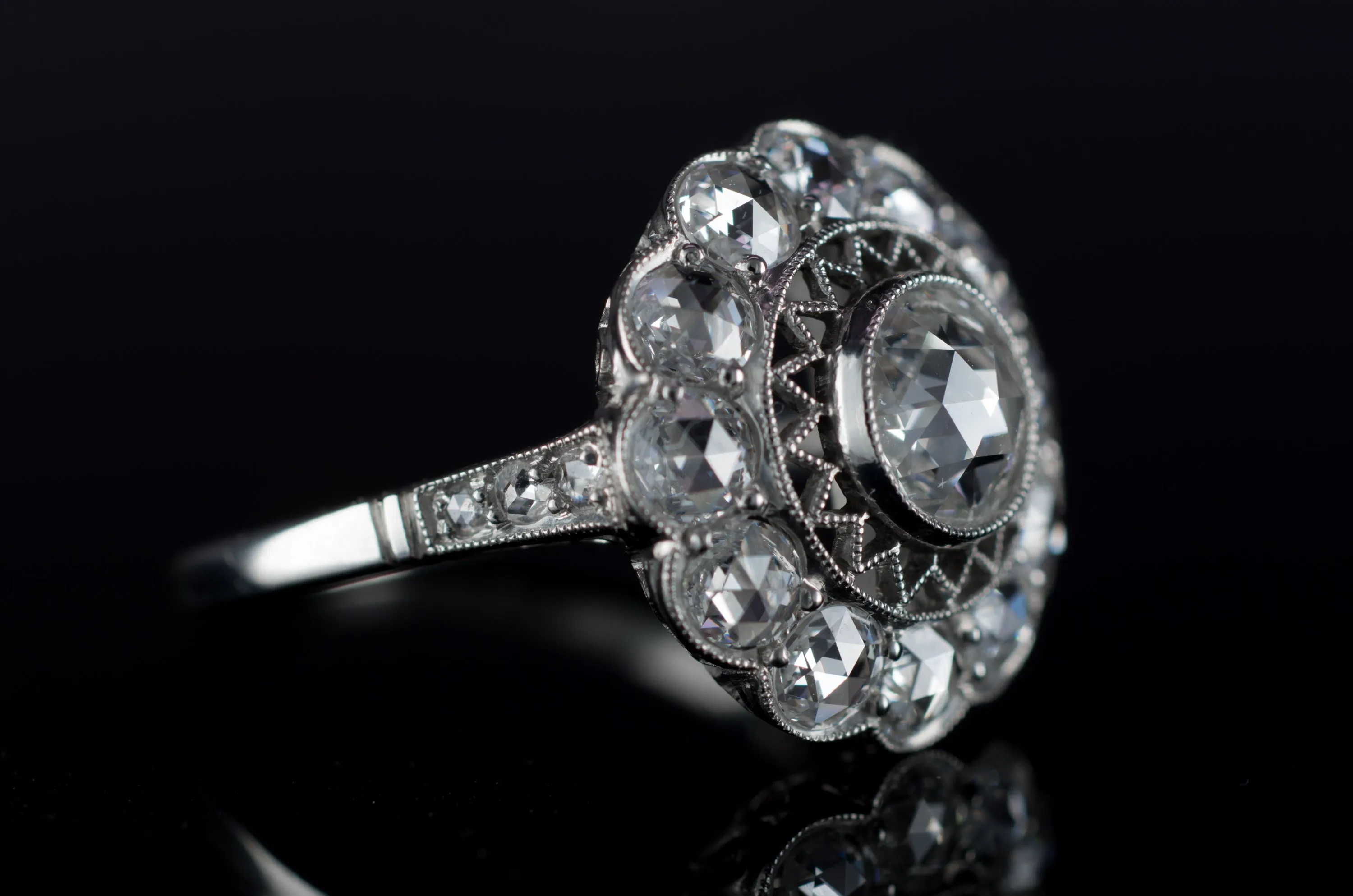 ROSE CUT DIAMOND HALO RING IN PLATINUM