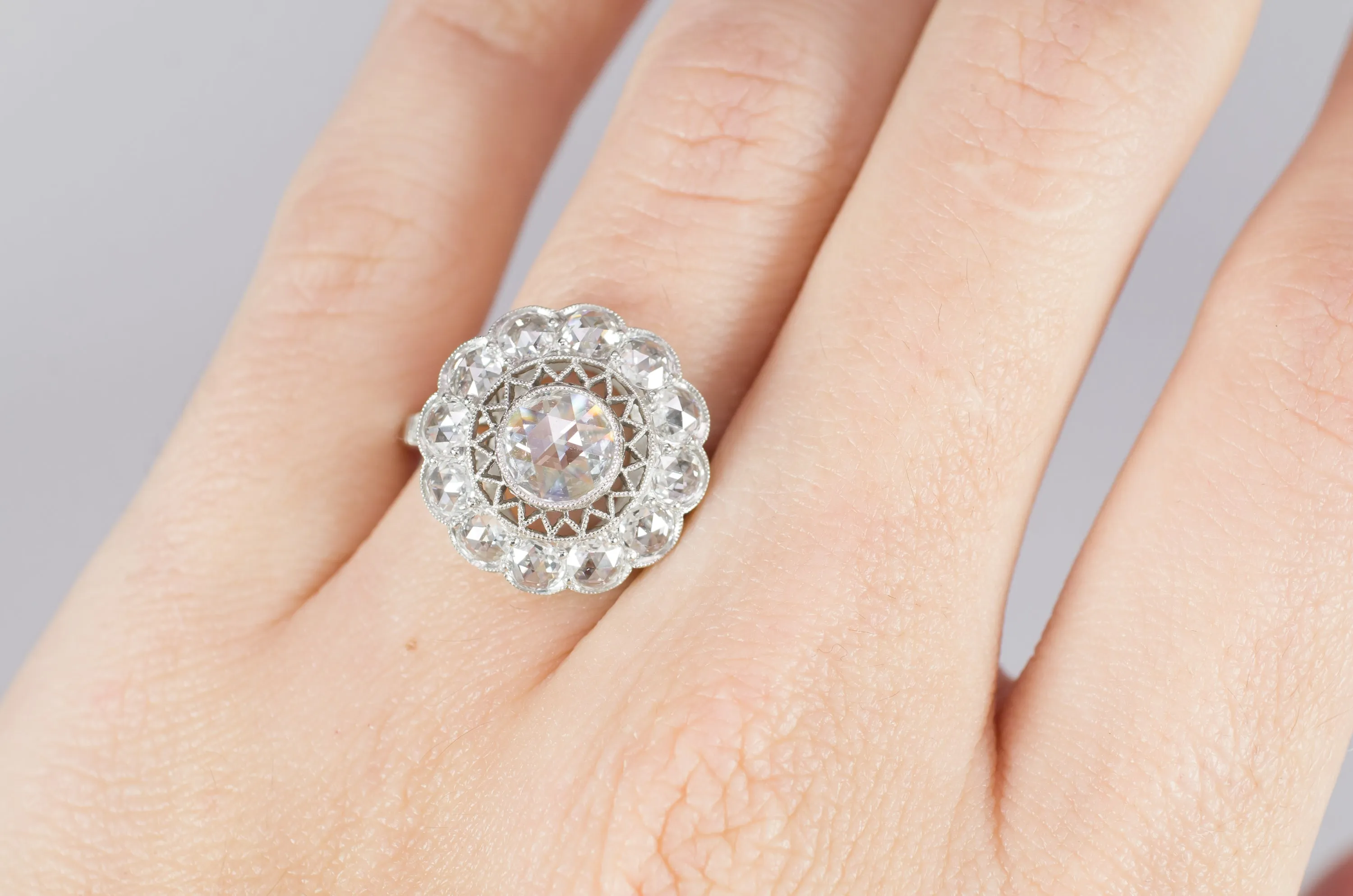 ROSE CUT DIAMOND HALO RING IN PLATINUM
