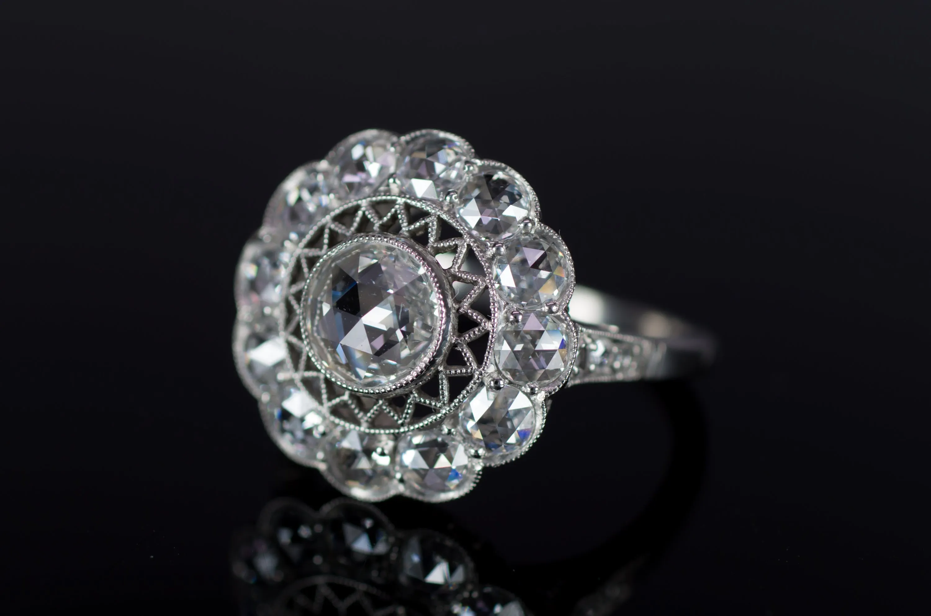 ROSE CUT DIAMOND HALO RING IN PLATINUM