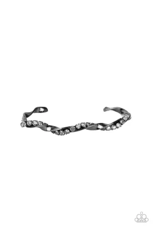 Twisted Twinkle - Black - White Rhinestone Warped Paparazzi Cuff Bracelet