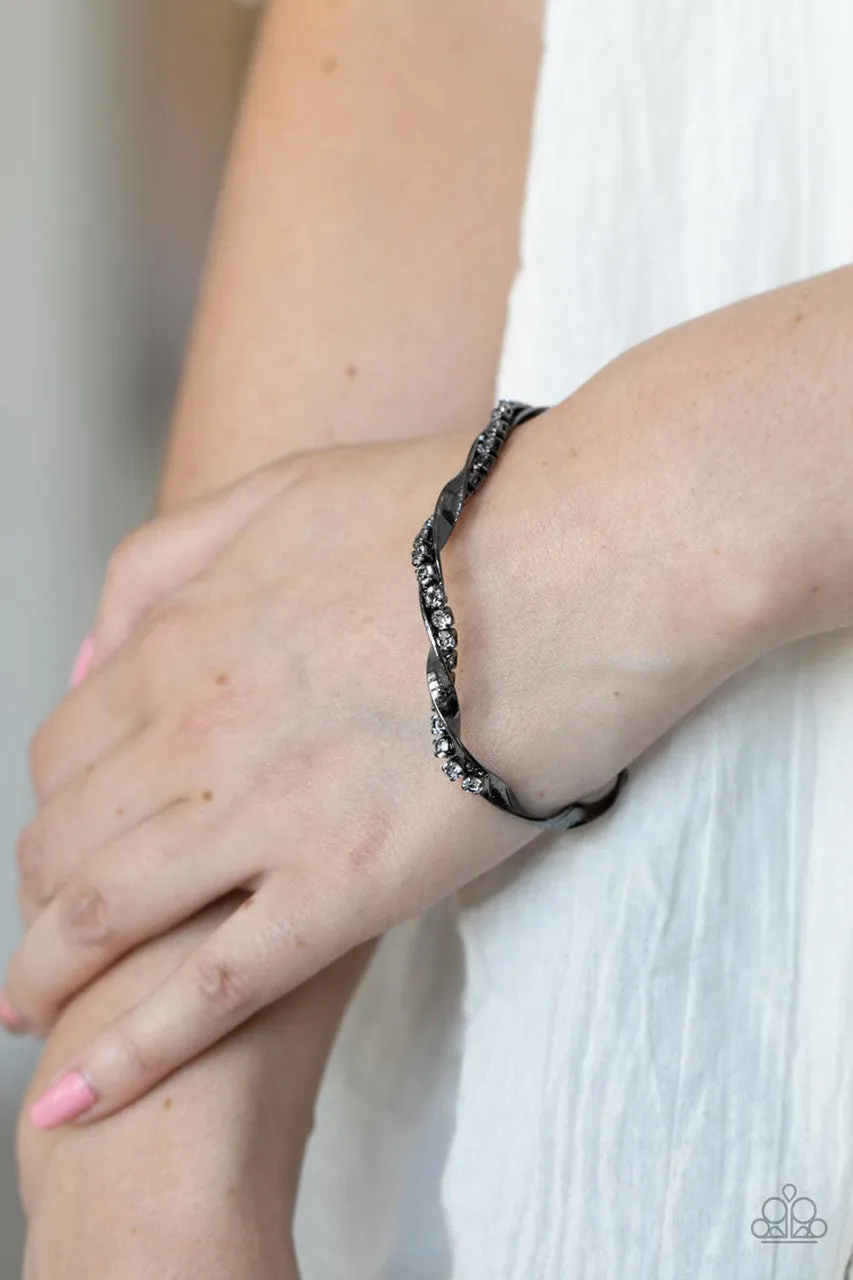 Twisted Twinkle - Black - White Rhinestone Warped Paparazzi Cuff Bracelet