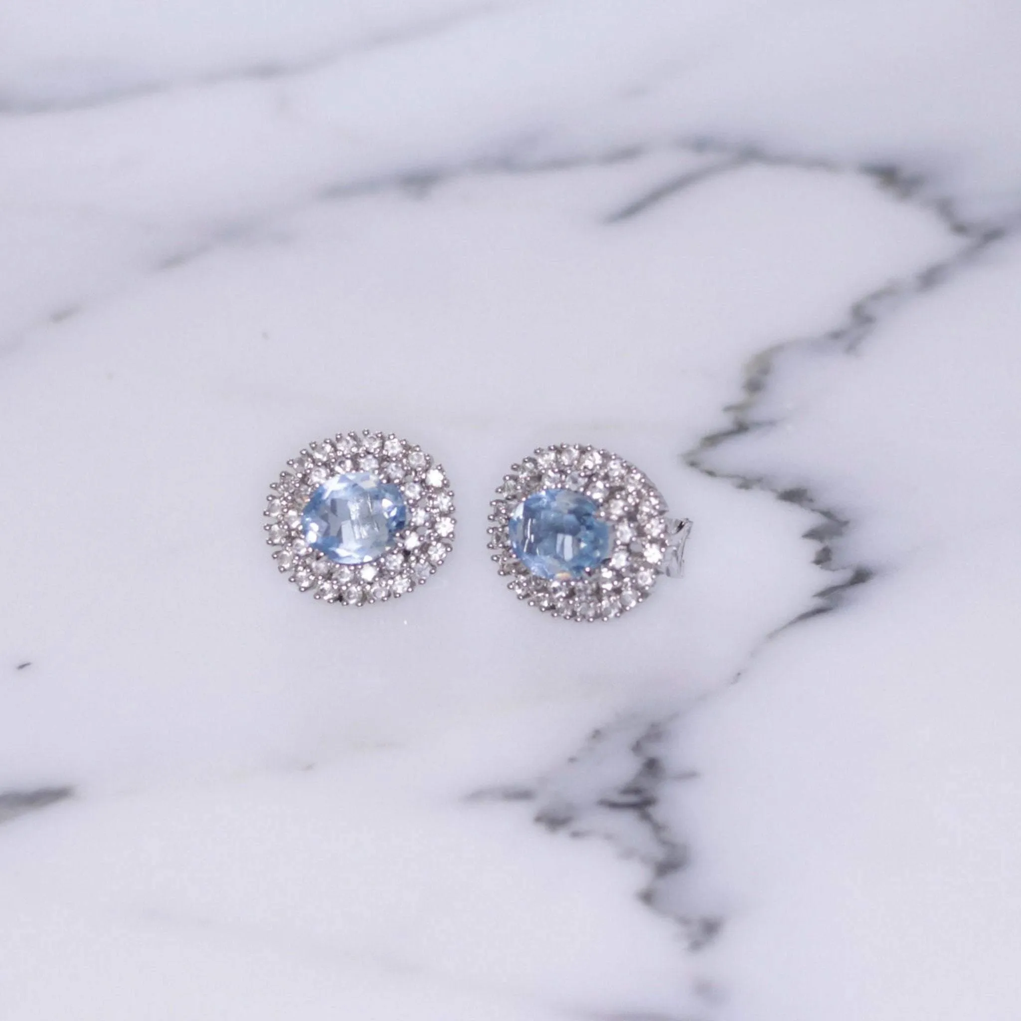 Vintage Icy Blue Topaz Crystal and CZ Halo Style Earrings Set In Sterling Silver